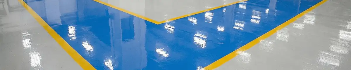 A factory floor professionally covered and marked with epoxy flooring in Lakeland, FL