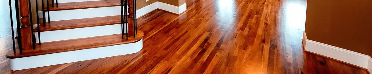 Base floor of a staircase with professionally restored wood flooring in Lakeland FL