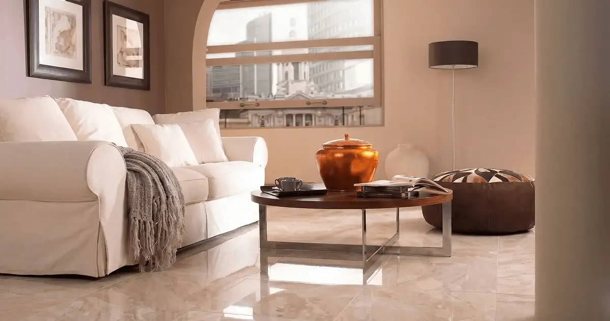 Modern living room with professionally installed marble flooring, a beige sofa, coffee table in Lakeland, FL