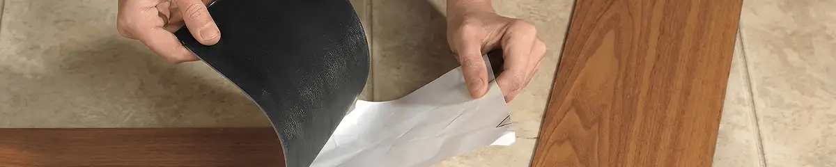 A professional installing vinyl flooring in Lakeland, FL