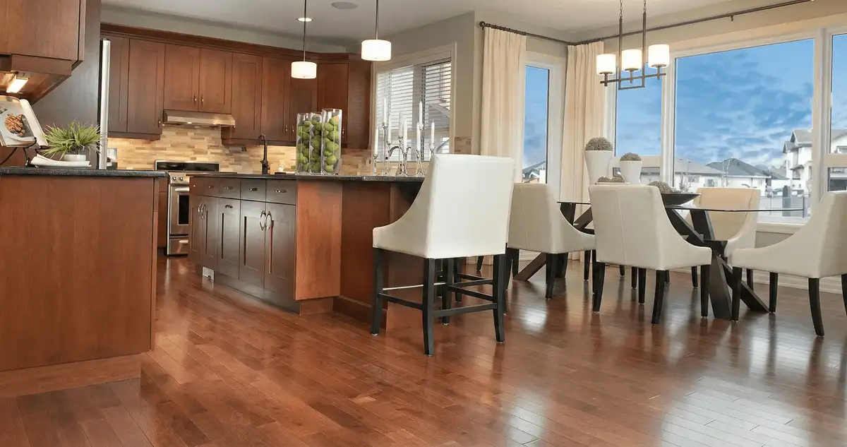 A modern kitchen with professionally installed wood flooring in Lakeland, FL